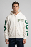 Front view of male model wearing off-white Concept Faith zip-up hoodie with green chest and sleeve graphics
